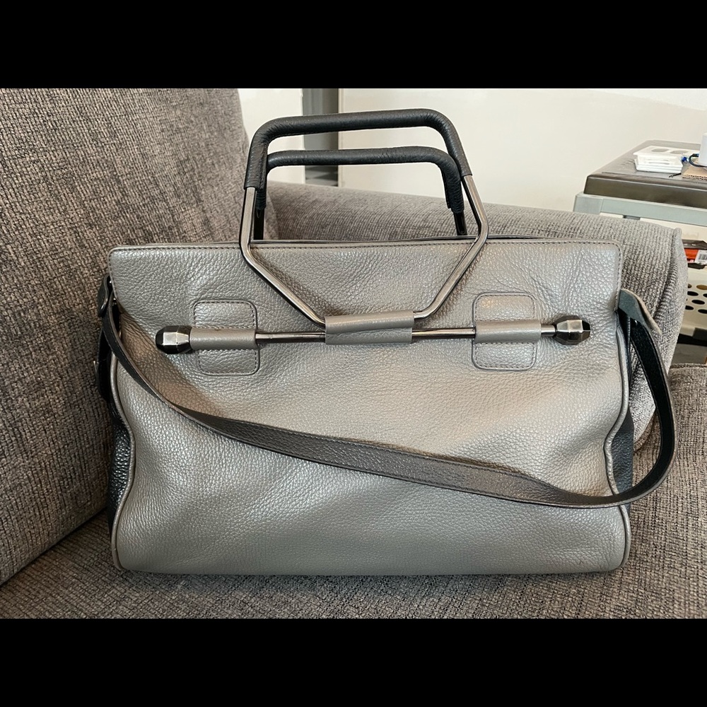 Viktor & Rolf 2 toned hand bag retail $1000. Comes with free designer Mk wallet
